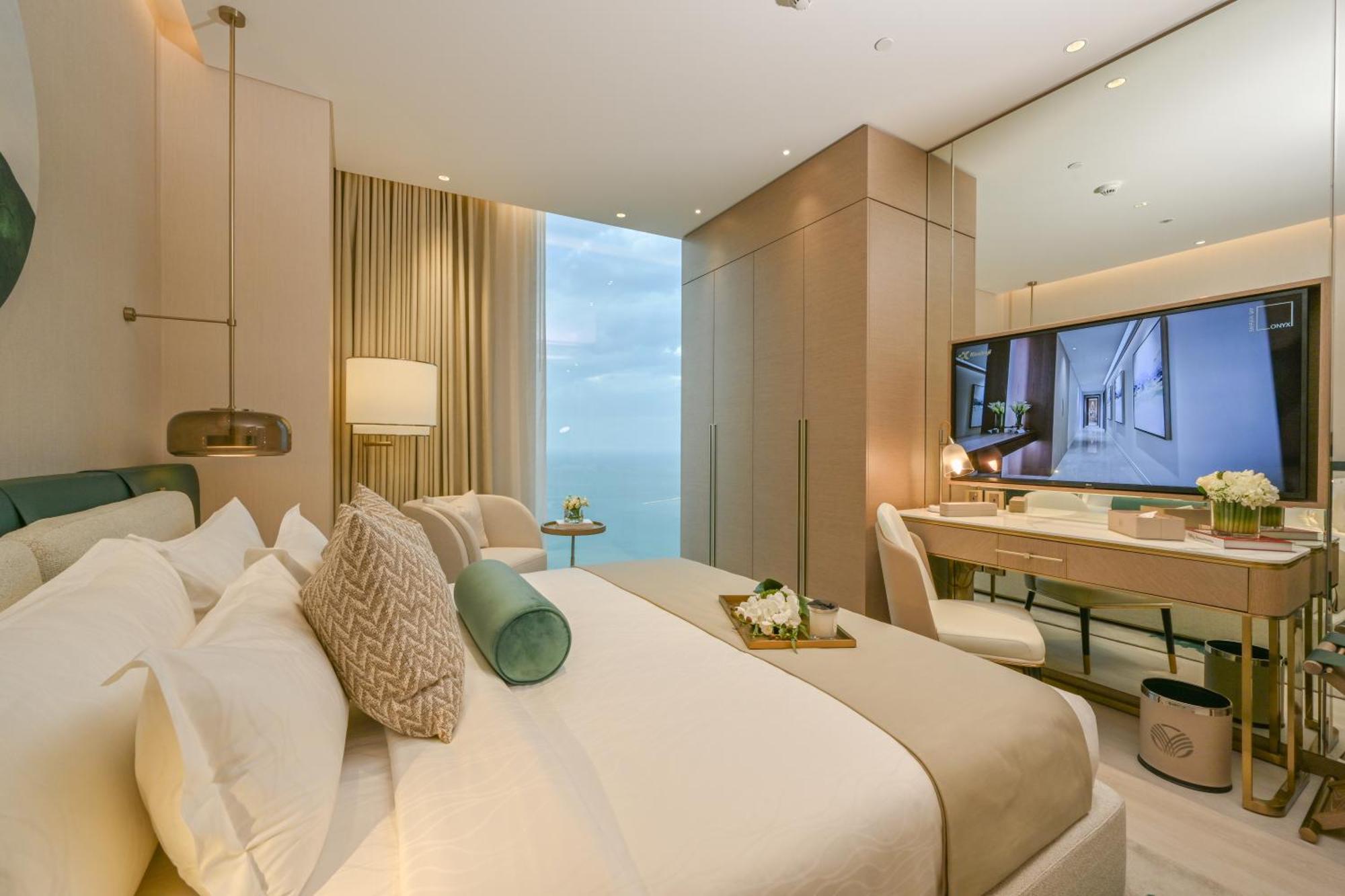 Onyx Rotana Hotel Манама Екстериор снимка A bedroom at the Ritz-Carlton, DIFC